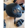 Image 7 : HJC full-face black motorcycle helmet with visor, a pair of Teknic armored gloves, and black leather