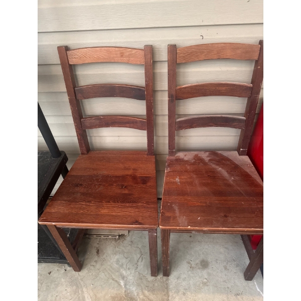 Two oak dining chairs