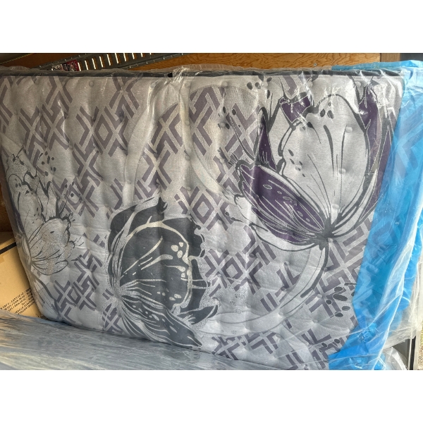 This is a Sealy Posturepedic mattress in its original plastic packaging.The mattress  Beautyrest Aus