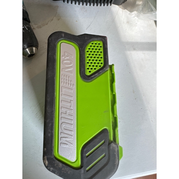 Greenworks 40V Lithium-Ion Battery, often used in lawn mowers and other outdoor power tools. 
Voltag