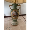 Image 8 : Porcelain table lamp featuring two handles, gold accents, and a classical painted pastoral scene. La