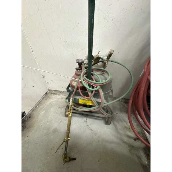 Acetylene torch kit with both bottles, cutters, hoses, and pressure gauges