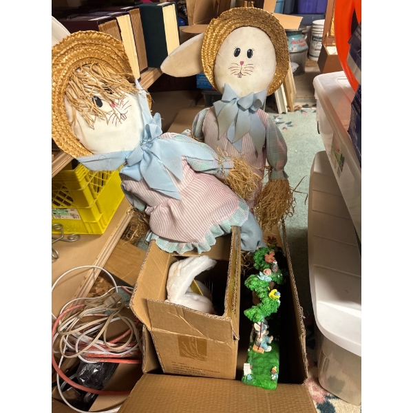 vintage-style bunny figures  handmade Easter scarecrow decorations featuring straw faces, straw hats