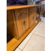 Image 2 :  vintage-style wooden coffee table features a rectangular top, sturdy turned legs, and built-in stor