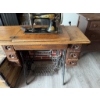 Image 6 : Singer treadle sewing machine, serial number 16165557, featuring original cast iron base and wooden 