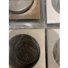 Image 21 : Canadian coins, featuring commemorative dollar coins and 50 cent pieces. Notable coins include a 197