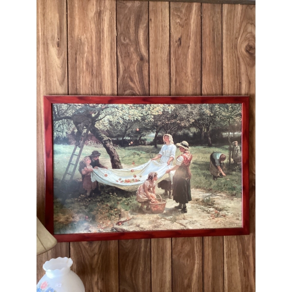 This image shows a framed print of the painting "The Apple Gatherers" by the English artist Frederic