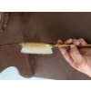 Image 4 : Gold-tone decorative hairbrush featuring ornate detailing on the back and handle and synthetic brist