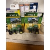 Image 1 : Two ERTL brand John Deere 8360R toy tractors, model year 2011. Both are new in original packaging an