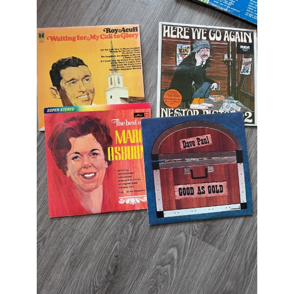 Four vinyl record albums: 'Waiting for My Call to Glory' by Roy Acuff, 'Here We Go Again' by Nestor 