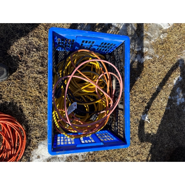 Folding basket with two yellow long extension cords and two shorter red extension cords.