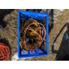 Image 1 : Folding basket with two yellow long extension cords and two shorter red extension cords.