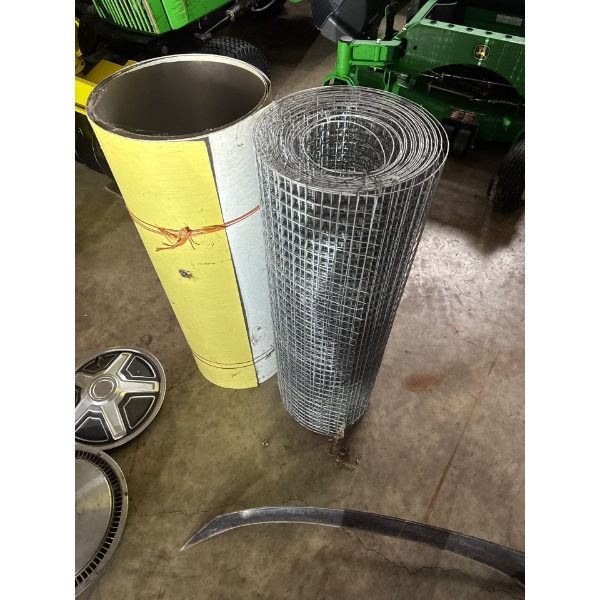 Roll a very nice brand new fencing material and roll of tin.