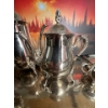 Image 3 : vintage  tea and coffee service set, often featuring ornate handles, feet, and finials
