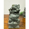 Image 2 : Foo Dogs or Fu Dogs. 
They are traditional Chinese guardian figures often placed in pairs to protect