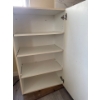 Image 2 : White kitchen cabinet. 23 inches wide by 39 inches high with black curved handle