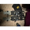Image 1 :  pair of Atlas snowshoes.  The snowshoes feature a durable aluminum frame 