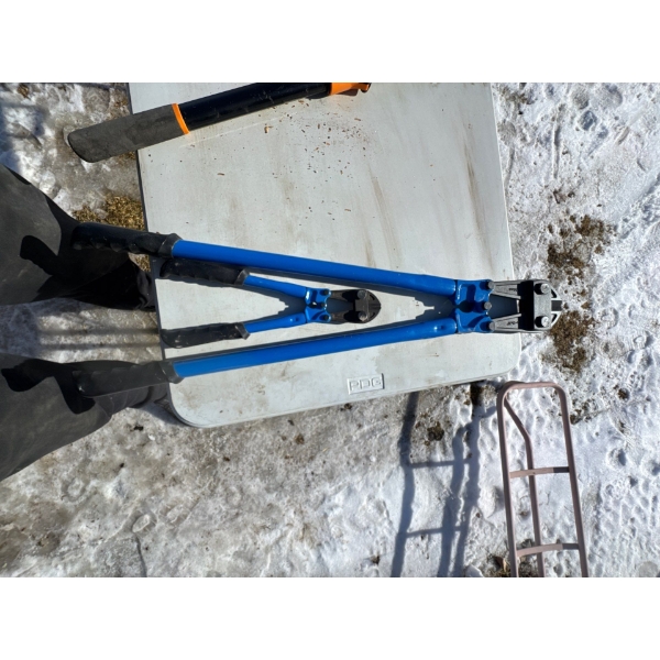  heavy-duty bolt cutters, used for cutting bolts, chains, threaded rods, and padlocks. 
Construction