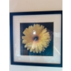Image 1 :  framed wall art print featuring a yellow Gerbera daisy. 