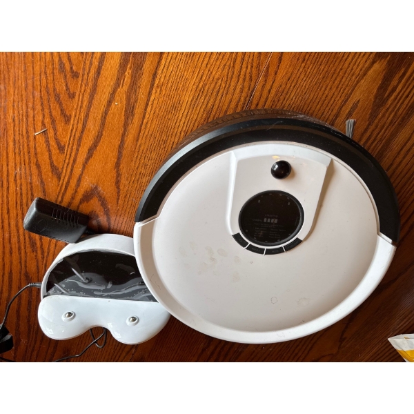 A bObsweep Junior Robotic Vacuum Cleaner, sweeps, vacuums, and filters. Dustbin Capacity is 1100 mL.