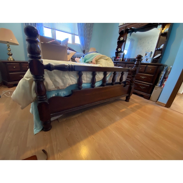  very nice wooden bed frame  86 inches long by 64 inches wide