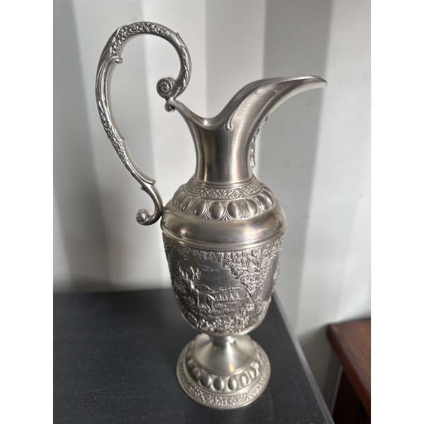  antique Victorian-era ewer or claret jug, likely featuring a "Cellini" pattern or similar Renaissan