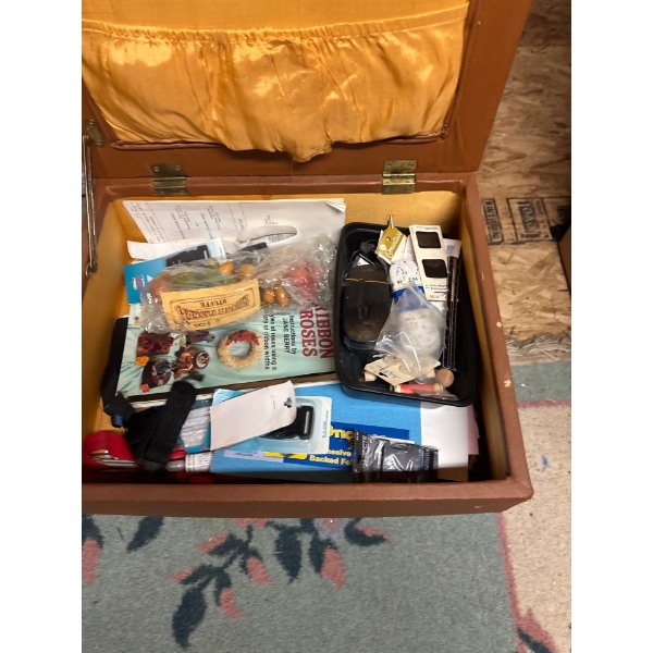 vintage mid-century modern storage ottoman or sewing stool, similar to items used for storing sewing