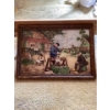 Image 2 : This is a vintage framed ceramic tile tray featuring artwork by the Dutch artist J.C. Van Hunnik. 
T