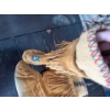 Image 2 : mukluks feature traditional fringe detailing, intricate beadwork on the vamp, and are lined for warm