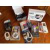 Image 1 : Garmin GPS, three brand new phone chargers, one car adapter, 3 piece car charger, one multiple plugi