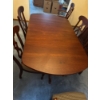 Image 1 :  dining table set is a traditional style furniture piece featuring a rich  solid cherry  and elegant