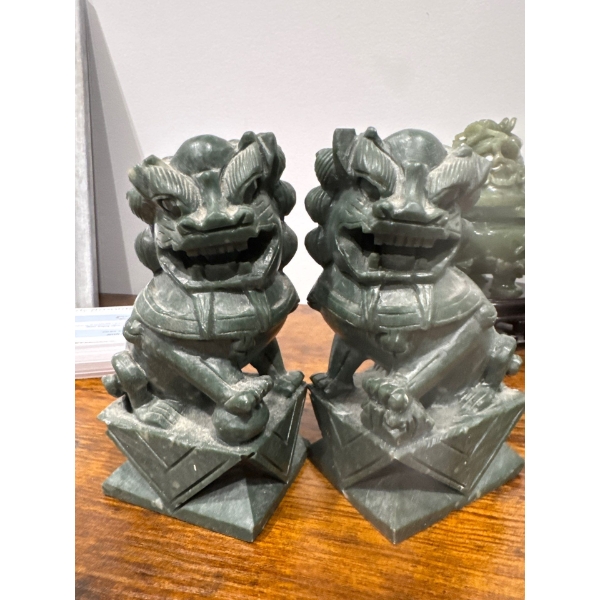 Foo Dogs or Fu Dogs. 
They are traditional Chinese guardian figures often placed in pairs to protect