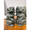 Image 1 : Foo Dogs or Fu Dogs. 
They are traditional Chinese guardian figures often placed in pairs to protect