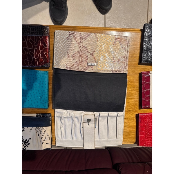 Miche interchangeable handbag shells designed to fit over a base bag. 