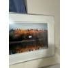Image 1 :  framed photograph of an autumn landscape.