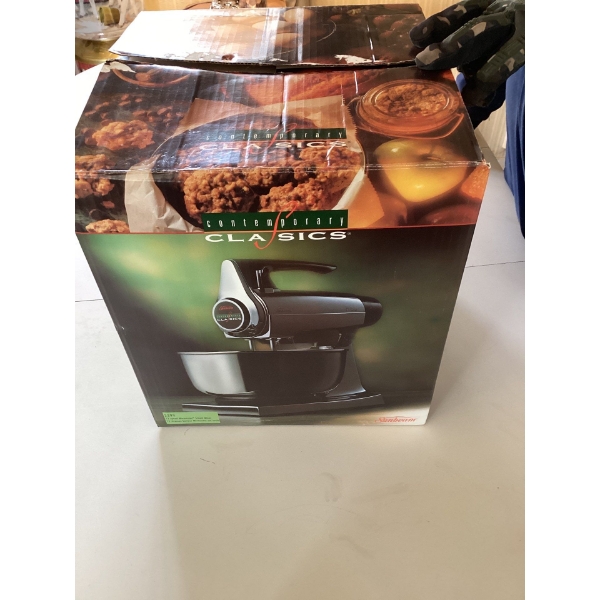 This is a Sunbeam Mixmaster Stand Mixer. Key specifications include: 
Powerful 350-watt motor
12-spe