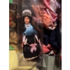 Image 3 : Several dolls in traditional German regional costumes, labeled "Westerland" and "Hamburg," housed in