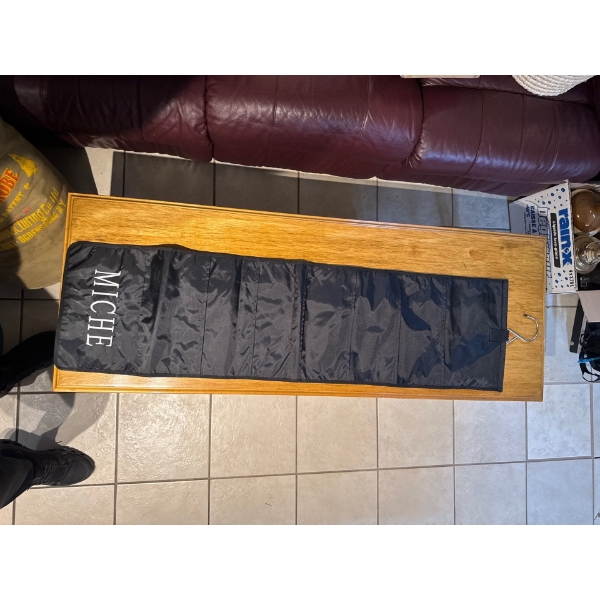 Miche Hanging Closet Shell Organizer designed to hold handbag shells. 
