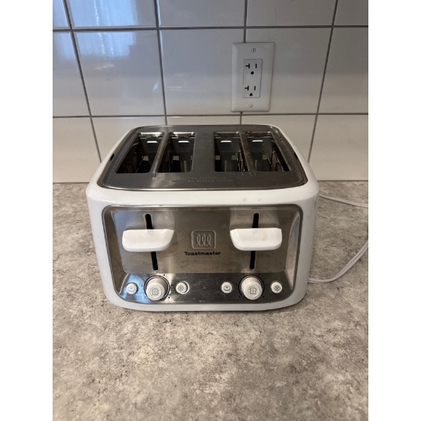  Toastmaster 4 Slice Toaster in white and stainless steel.