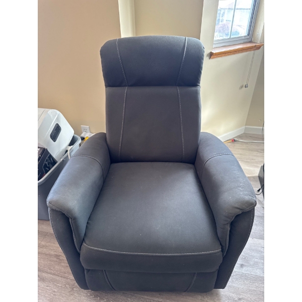 Grey leather power reclining chair, in great working condition