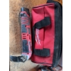 Image 4 : Milwaukee M12 cordless multi-tool with 12V Lithium-Ion battery, charger, and Milwaukee branded carry