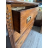 Image 4 : Oak dresser featuring three drawers with brass handles, decorative leaf carving, and attached vertic