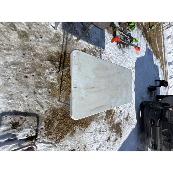 PDG adjustable folding table.