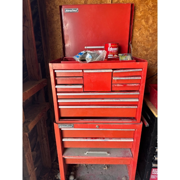 red International brand rolling tool chest and cabinet set.
Constructed from steel for durability an
