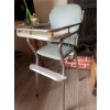 Image 1 : High chair with chrome metal frame, light blue upholstered vinyl seat and back, white footrest, and 