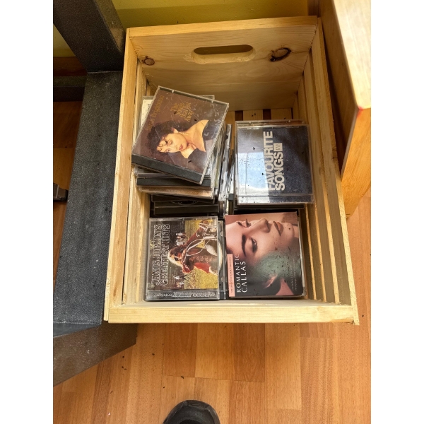 Wood crate full of CDs.