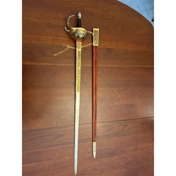  Spanish  sword, likely produced in the 20th century. brought back from spain in the 60s 
Origin: Ma