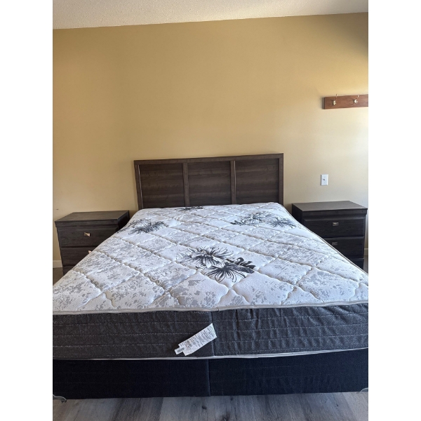Bed frame with headboard. Headboard is 61 inches wide, 46 inches tall