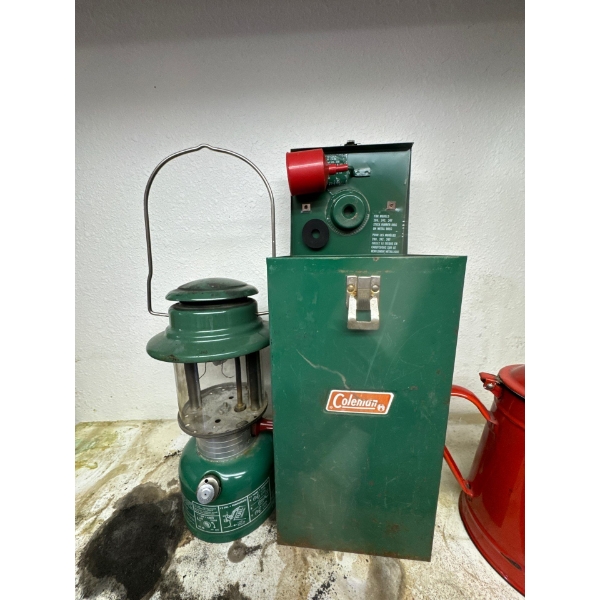  vintage Coleman lantern, potentially a Canadian-made Model 335, complete with its metal carrying ca
