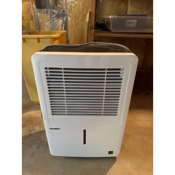 Comfee dehumidifier, a home appliance used to reduce humidity levels in a room.
Model: Based on sear